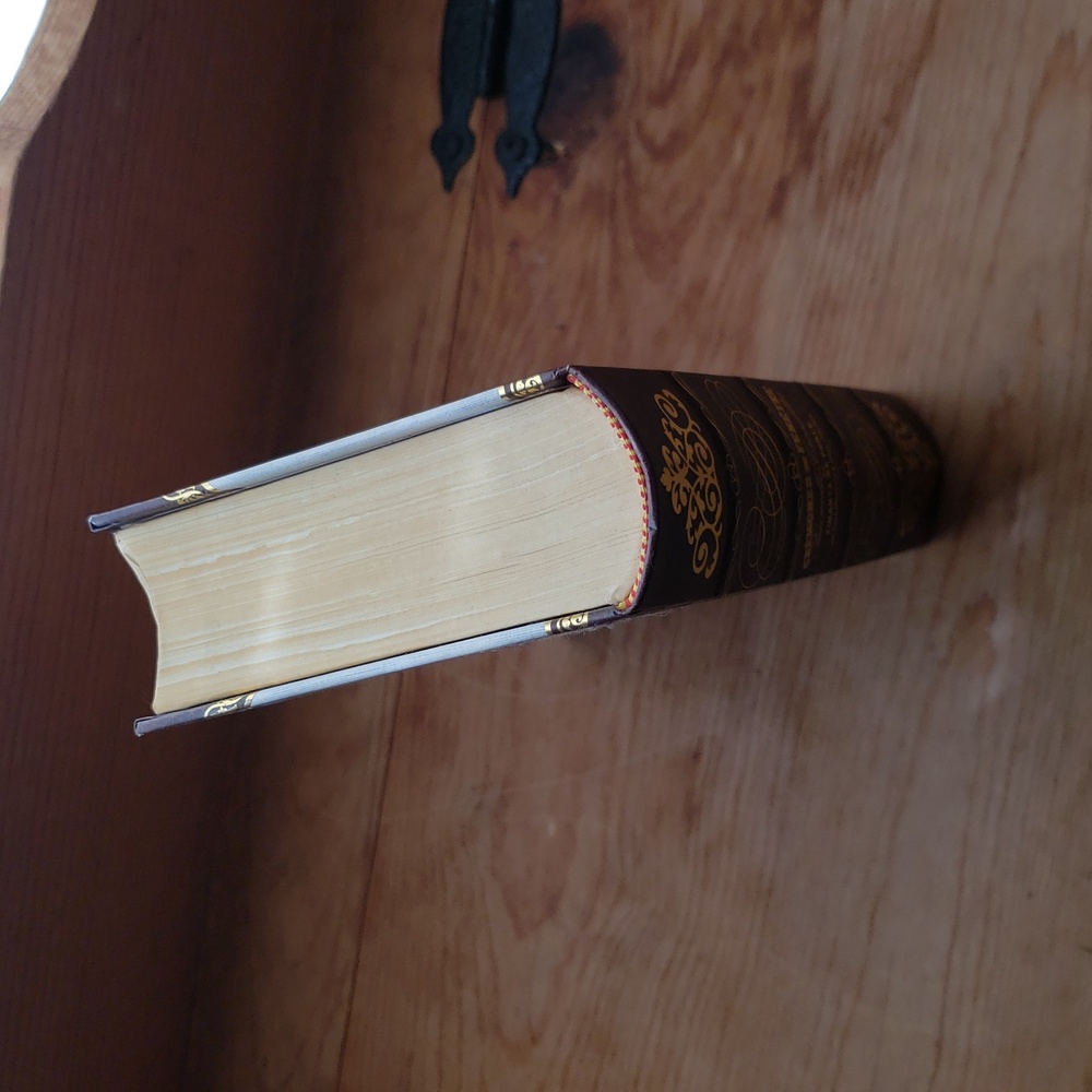 Elegant Gold and Cream Coffee Table Book with Hidden Compartment - Picture 11 of 13